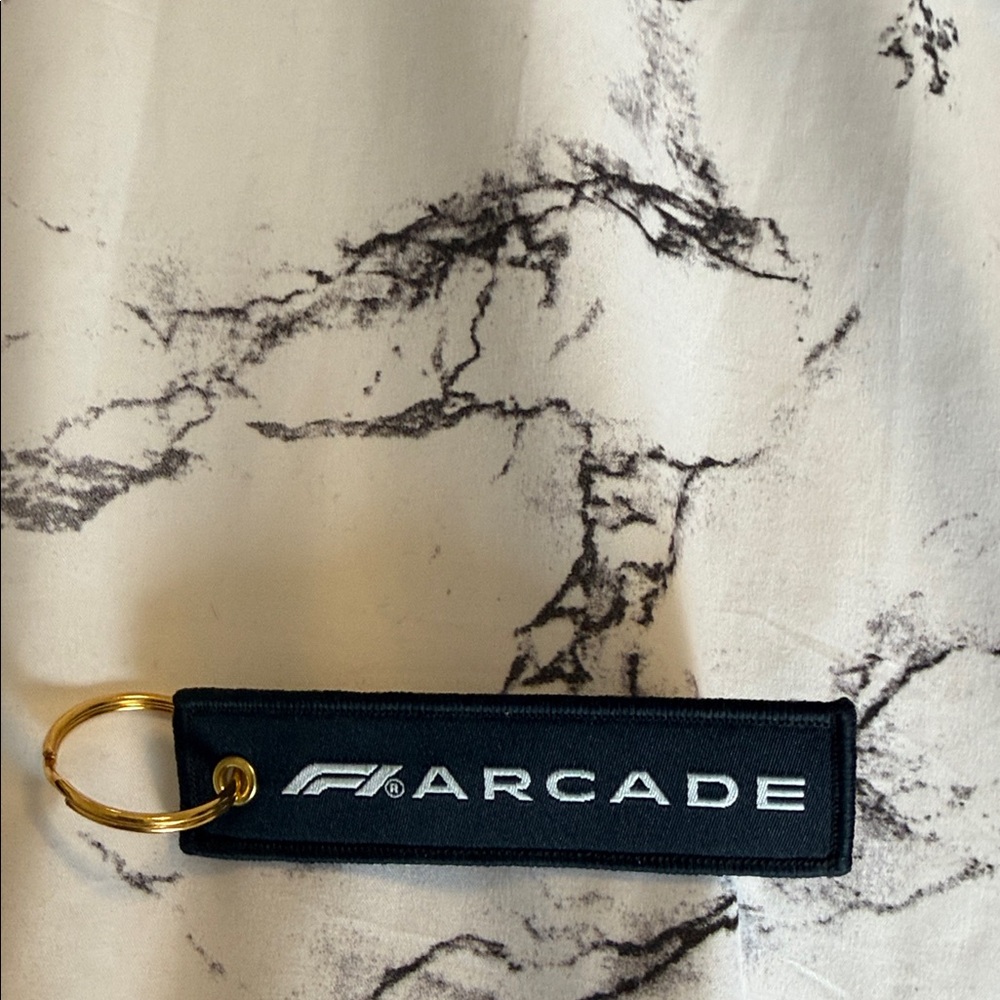 F1 Black Keychain with Gold Ring
